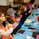 Volunteers and healthcare workers prepare covid-19 vaccine doses at a vaccination hub location in League City, Texas, on February 5, 2021.
